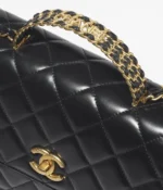 SMALL FLAP BAG WITH TOP HANDLE. - Image 2